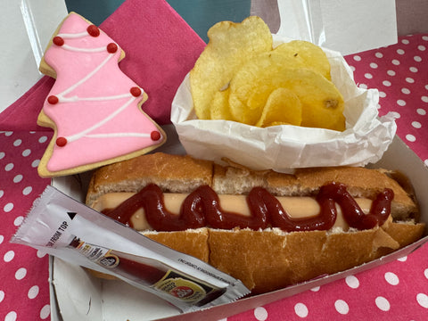 Hot dog with crisps and a Christmas  Tuck In cookie