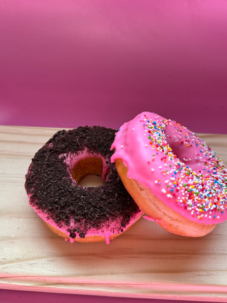 A Doughnut dipped in Chocolate with Oreos