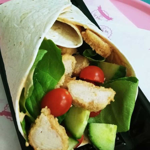 Health Wrap filled with Lettuce, Rosa Tomato, Chicken Strips & Tuck-In Sauce